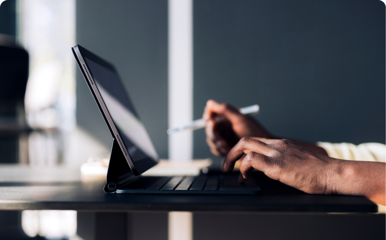 Digital work on tablet and keyboard